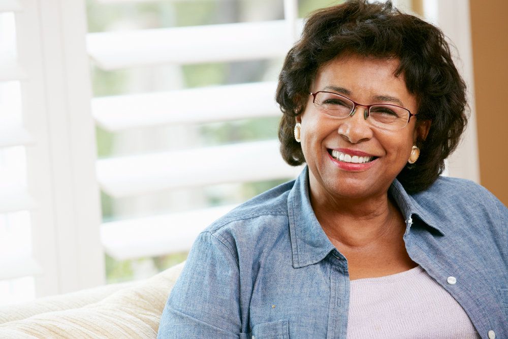 Smiling elderly woman in glasses